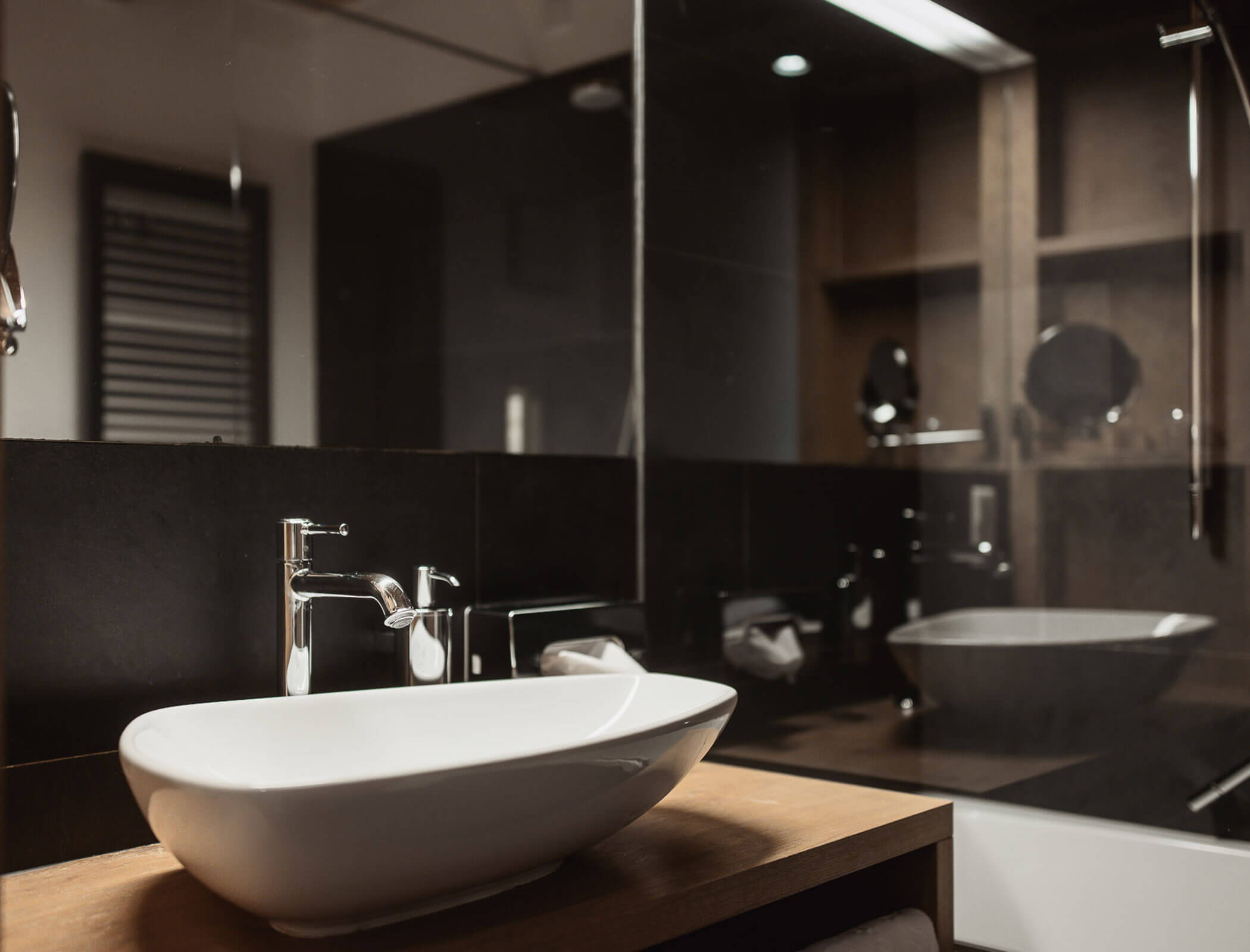 Waschbecken im Badezimmer vom Apartment Helmuth Superior